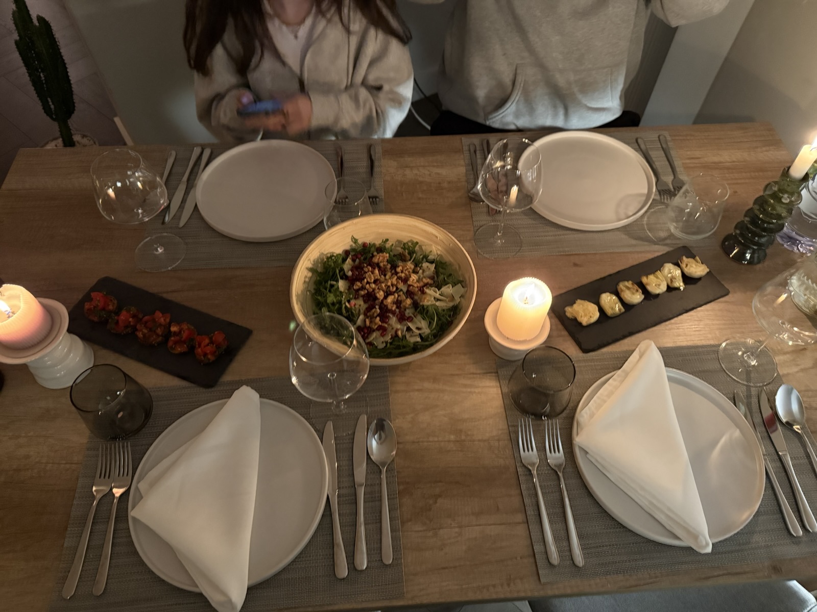 A dinner table set for friends