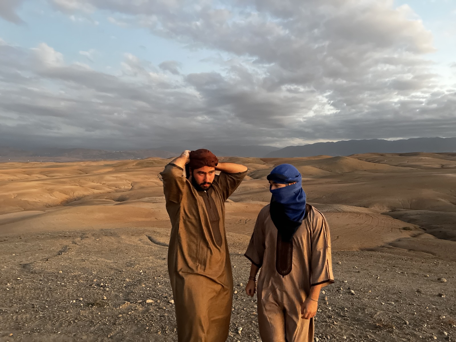 In the desert, wrapped up against the sun